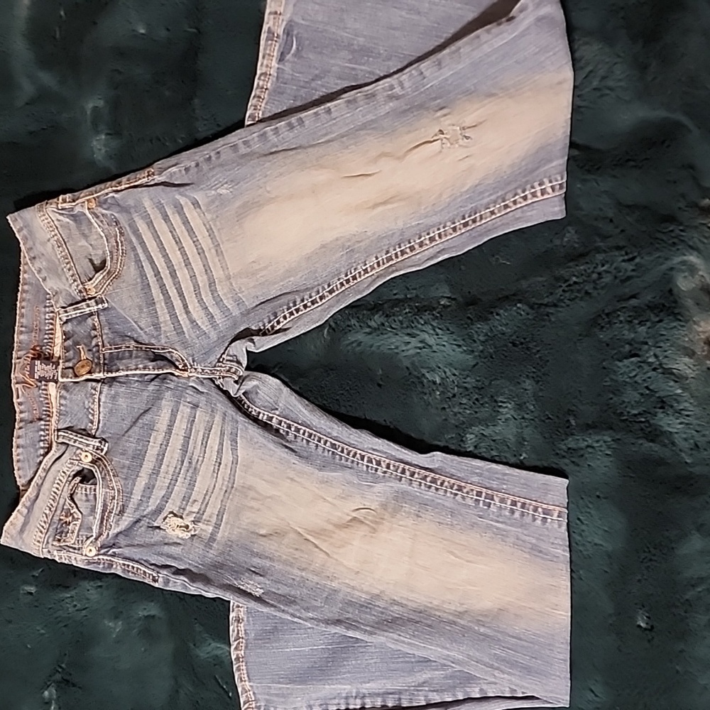 Vanity size 11 distressed jeans